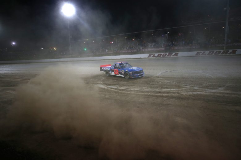 ROSSBURG, OHIO - AUGUST 01: Stewart Friesen, driver of the #52 Halmar International Chevrolet, celebrates with a burnout after winning the NASCAR Gander Outdoor Truck Series Eldora Dirt Derby at Eldora Speedway on August 01, 2019 in Rossburg, Ohio. (Photo by Matt Sullivan/Getty Images) | Getty Images