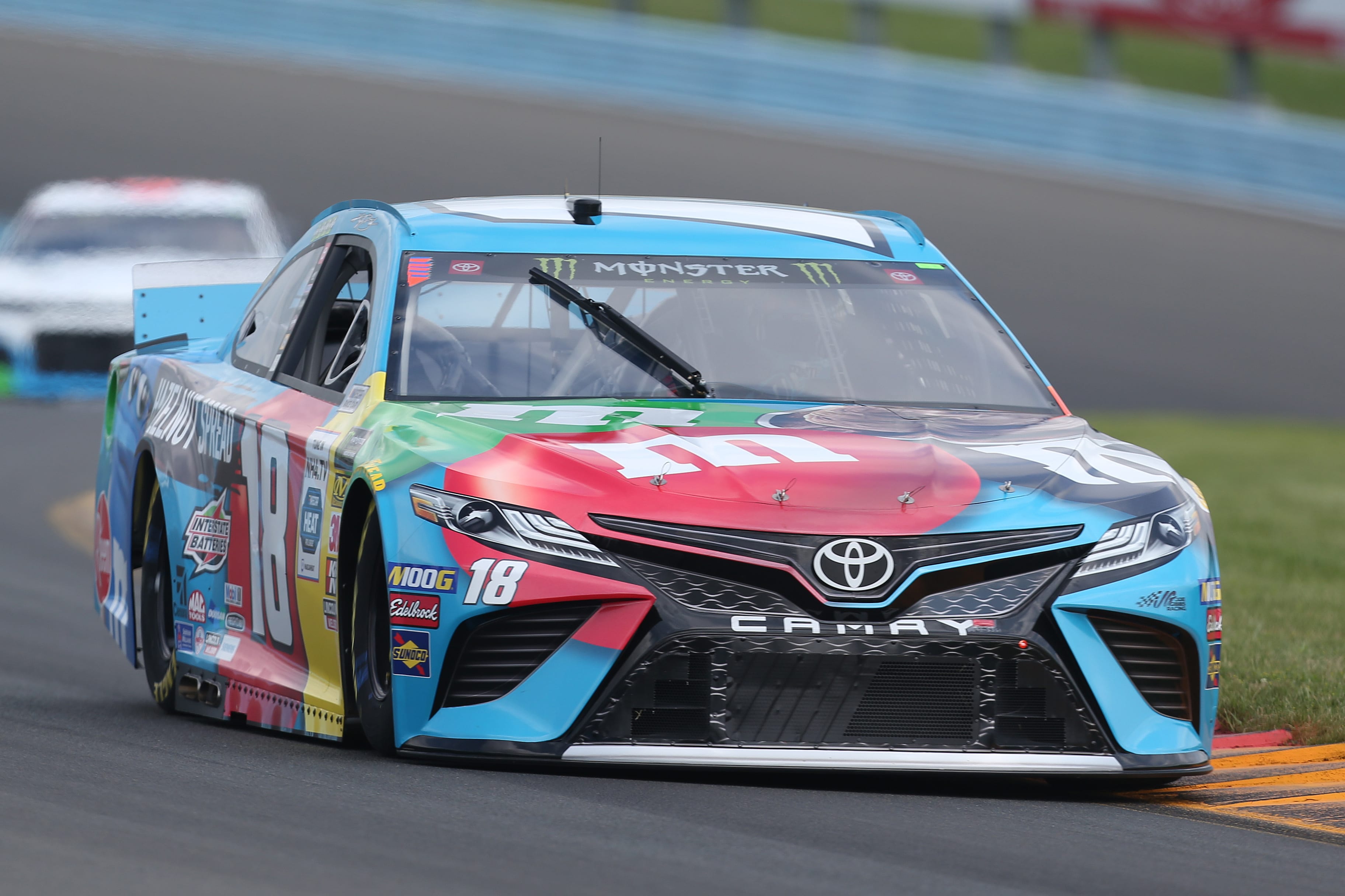WATKINS GLEN, NEW YORK - AUGUST 03: Kyle Busch, driver of the #18 M&M's Hazelnut Toyota, drives during practice for the Monster Energy NASCAR Cup Series Go Bowling at The Glen at Watkins Glen International on August 03, 2019 in Watkins Glen, New York. (Photo by Matt Sullivan/Getty Images) | Getty Images