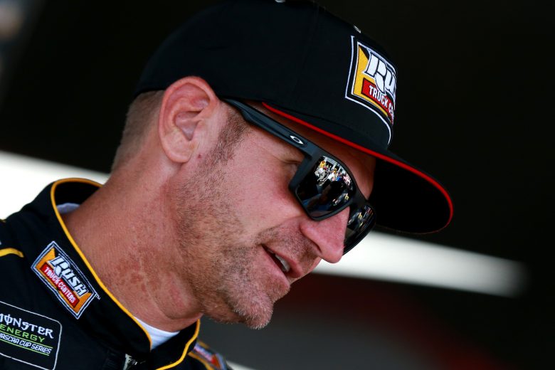 WATKINS GLEN, NEW YORK - AUGUST 03: Clint Bowyer, driver of the #14 Rush Truck Centers/Haas Automation Ford, stands in the garage area during practice for the Monster Energy NASCAR Cup Series Go Bowling at The Glen at Watkins Glen International on August 03, 2019 in Watkins Glen, New York. (Photo by Sean Gardner/Getty Images) | Getty Images