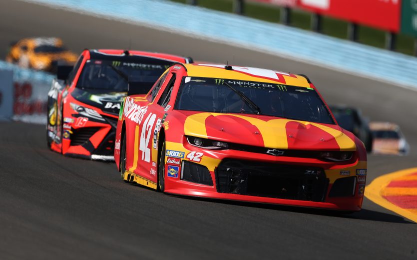 WATKINS GLEN, NEW YORK - AUGUST 04: Kyle Larson, driver of the #42 McDonald's Chevrolet,leads a pack of cars during the Monster Energy NASCAR Cup Series Go Bowling at The Glen at Watkins Glen International on August 04, 2019 in Watkins Glen, New York. (Photo by Brian Lawdermilk/Getty Images) | Getty Images