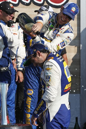 Chase Elliott and Alan Gustafson celebrate in Victory Lane at Watkins Glen.