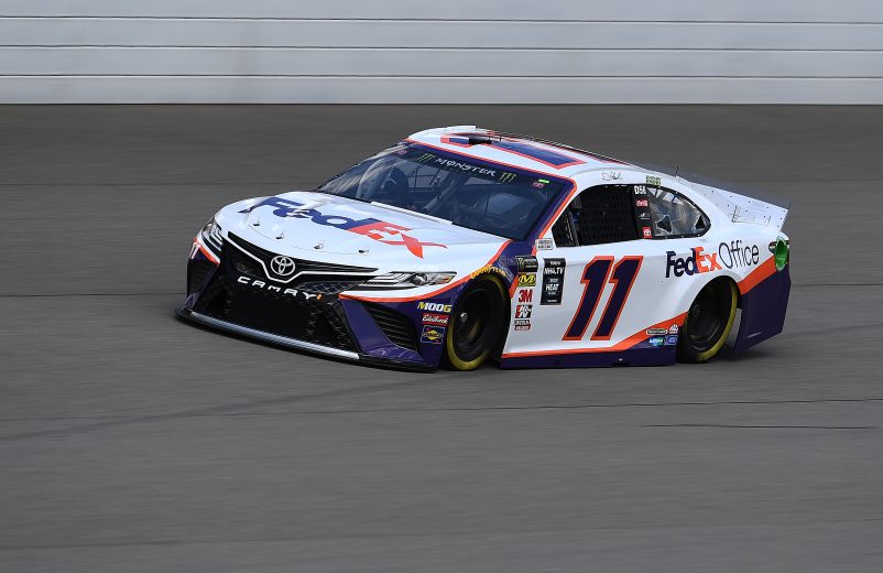 BROOKLYN, MICHIGAN - AUGUST 09: Denny Hamlin, driver of the #11 FedEx Office Toyota, drives during practice for the Monster Energy NASCAR Cup Series Consumers Energy 400 at Michigan International Speedway on August 09, 2019 in Brooklyn, Michigan. (Photo by Stacy Revere/Getty Images) | Getty Images