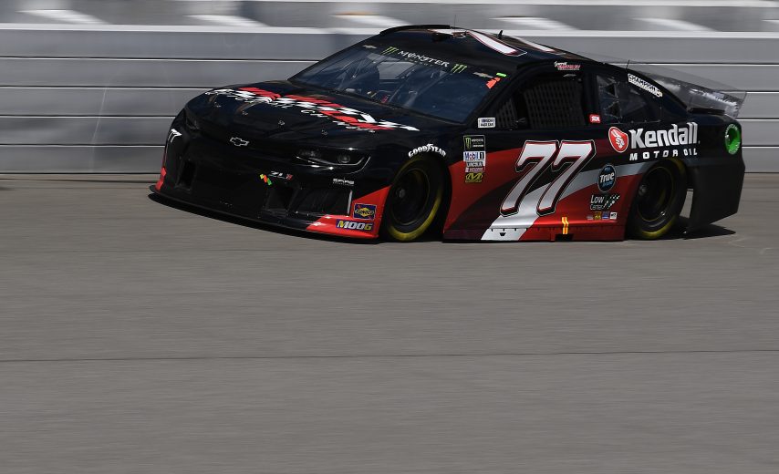BROOKLYN, MICHIGAN - AUGUST 09: Garrett Smithley, driver of the #77 Victory Lane Quick Oil Change/Kendall Chevrolet, drives during practice for the Monster Energy NASCAR Cup Series Consumers Energy 400 at Michigan International Speedway on August 09, 2019 in Brooklyn, Michigan. (Photo by Stacy Revere/Getty Images) | Getty Images