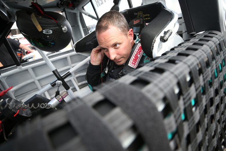 BROOKLYN, MICHIGAN - AUGUST 09: Johnny Sauter, driver of the #13 Tenda Heal Ford, sits in his truck during practice for the NASCAR Gander Outdoor Truck Series Corrigan Oil 200 at Michigan International Speedway on August 09, 2019 in Brooklyn, Michigan. (Photo by Matt Sullivan/Getty Images) | Getty Images