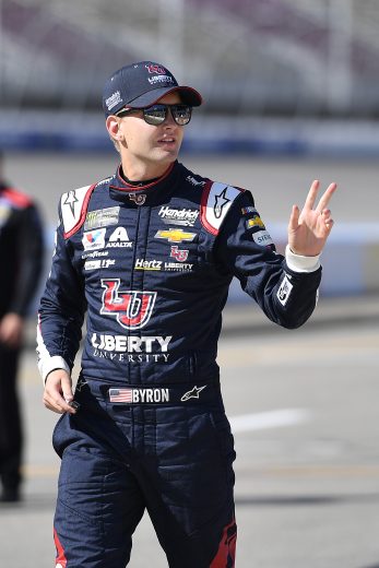 BROOKLYN, MICHIGAN - AUGUST 09: William Byron, driver of the #24 Liberty University Chevrolet, walks to his car during qualifying for the Monster Energy NASCAR Cup Series Consumers Energy 400 at Michigan International Speedway on August 09, 2019 in Brooklyn, Michigan. (Photo by Quinn Harris/Getty Images) | Getty Images