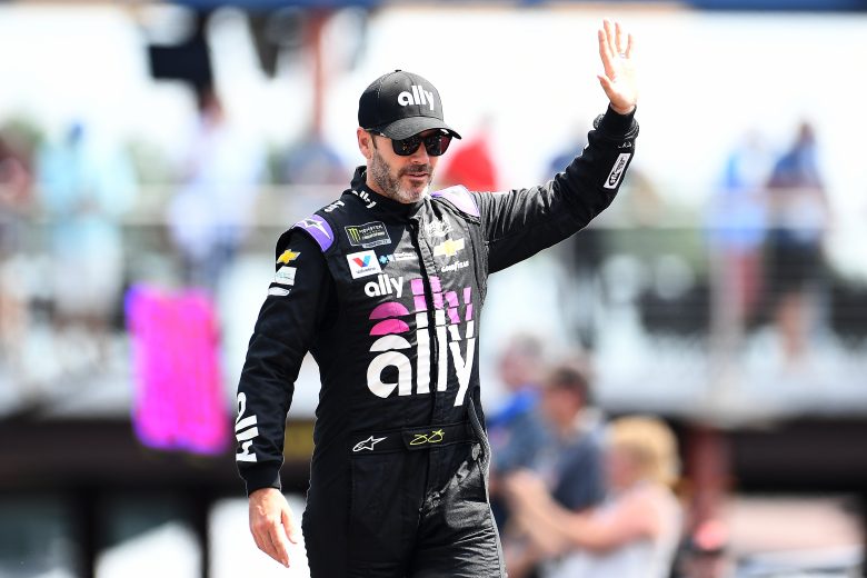 BROOKLYN, MICHIGAN - AUGUST 11: Jimmie Johnson, driver of the #48 Ally Chevrolet, greets the crowd at driver introductions during the Monster Energy NASCAR Cup Series Consumers Energy 400 at Michigan International Speedway on August 11, 2019 in Brooklyn, Michigan. (Photo by Stacy Revere/Getty Images) | Getty Images