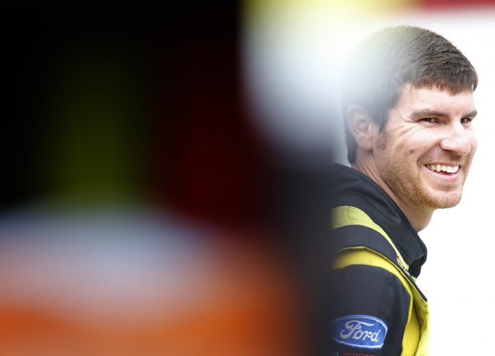 BRISTOL, TENNESSEE - AUGUST 15: Grant Enfinger, driver of the #98 ThorSport Racing/Curb Records Ford, stands in the garage during practice for the NASCAR Gander Outdoor Truck Series UNOH 200 presented by Ohio Logistics at Bristol Motor Speedway on August 15, 2019 in Bristol, Tennessee. (Photo by Brian Lawdermilk/Getty Images) | Getty Images