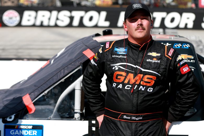 BRISTOL, TENNESSEE - AUGUST 15: Brett Moffitt, driver of the #24 Midnight Moon Moonshine Chevrolet, stands on the grid during qualifying for the NASCAR Gander Outdoor Truck Series UNOH 200 presented by Ohio Logistics at Bristol Motor Speedway on August 15, 2019 in Bristol, Tennessee. (Photo by Sean Gardner/Getty Images) | Getty Images