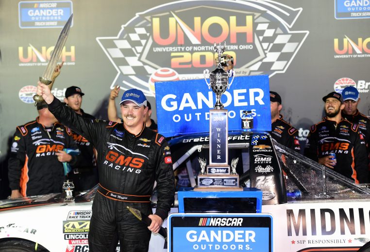 BRISTOL, TENNESSEE - AUGUST 15: Brett Moffitt, driver of the #24 Midnight Moon Moonshine Chevrolet, celebrates in Victory Lane after winning the NASCAR Gander Outdoor Truck Series UNOH 200 presented by Ohio Logistics at Bristol Motor Speedway on August 15, 2019 in Bristol, Tennessee. (Photo by Jared C. Tilton/Getty Images) | Getty Images