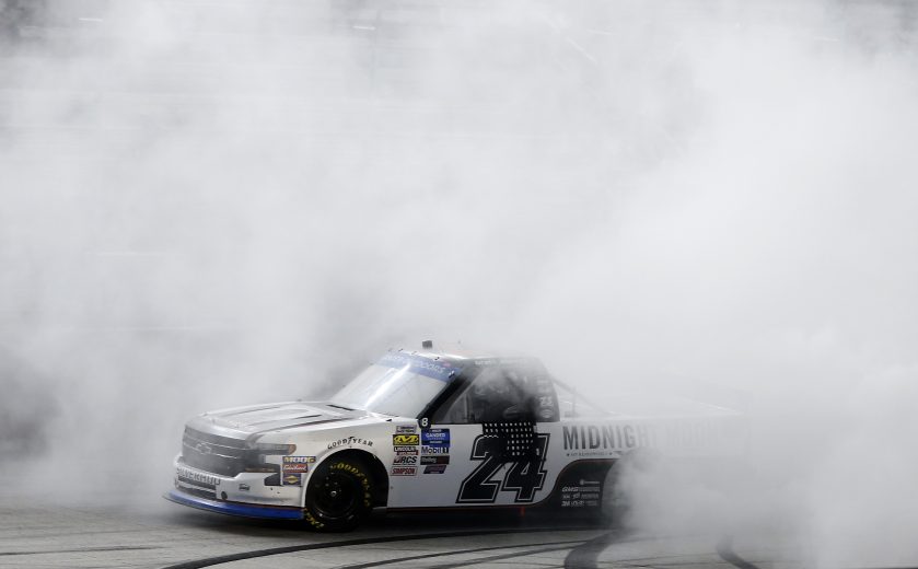BRISTOL, TENNESSEE - AUGUST 15: Brett Moffitt, driver of the #24 Midnight Moon Moonshine Chevrolet, celebrates after winning the NASCAR Gander Outdoor Truck Series UNOH 200 presented by Ohio Logistics at Bristol Motor Speedway on August 15, 2019 in Bristol, Tennessee. (Photo by Brian Lawdermilk/Getty Images) | Getty Images