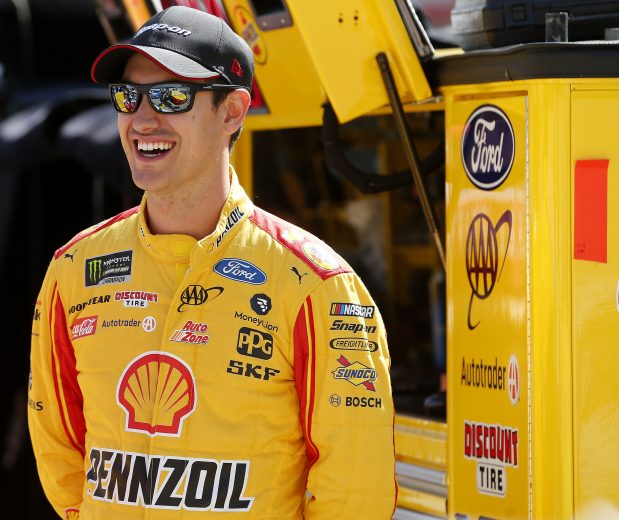 BRISTOL, TENNESSEE - AUGUST 16: Joey Logano, driver of the #22 Shell Pennzoil Ford, stands in the garage during practice for the Monster Energy NASCAR Cup Series Bass Pro Shops NRA Night Race at Bristol Motor Speedway on August 16, 2019 in Bristol, Tennessee. (Photo by Brian Lawdermilk/Getty Images) | Getty Images