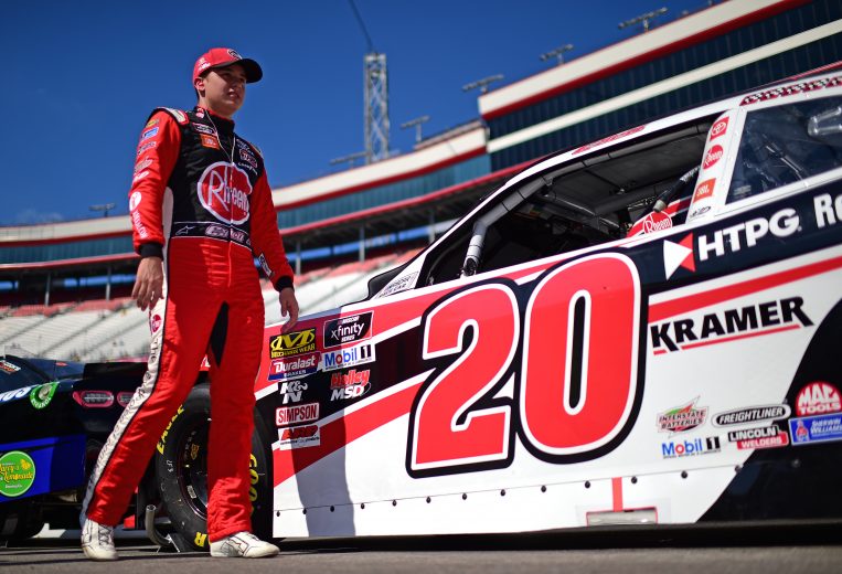 BRISTOL, TENNESSEE - AUGUST 16: Christopher Bell, driver of the #20 Rheem-HtPG Refrigeration Products Toyota, stands on the grid during qualifying for the NASCAR Xfinity Series Food City 300 at Bristol Motor Speedway on August 16, 2019 in Bristol, Tennessee. (Photo by Jared C. Tilton/Getty Images) | Getty Images