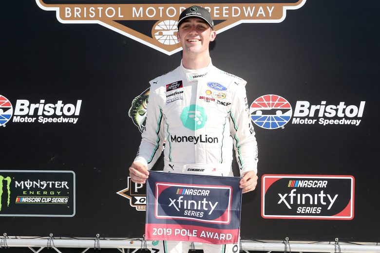BRISTOL, TENNESSEE - AUGUST 16: Austin Cindric, driver of the #22 MoneyLion Ford, poses with the Pole Award after posting the quickest lap during qualifying for the NASCAR Xfinity Series Food City 300 at Bristol Motor Speedway on August 16, 2019 in Bristol, Tennessee. (Photo by Brian Lawdermilk/Getty Images) | Getty Images