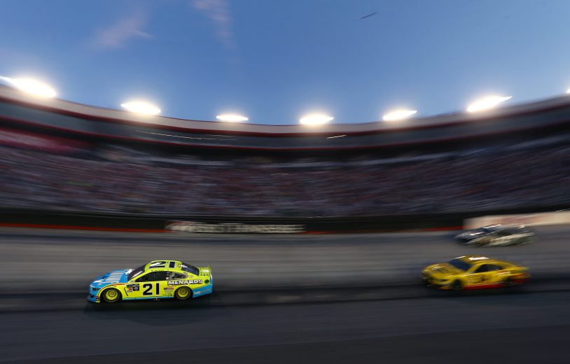 BRISTOL, TENNESSEE - AUGUST 17: Paul Menard, driver of the #21 Menards/Knauf Ford, leads a pack of cars during the Monster Energy NASCAR Cup Series Bass Pro Shops NRA Night Race at Bristol Motor Speedway on August 17, 2019 in Bristol, Tennessee. (Photo by Brian Lawdermilk/Getty Images) | Getty Images