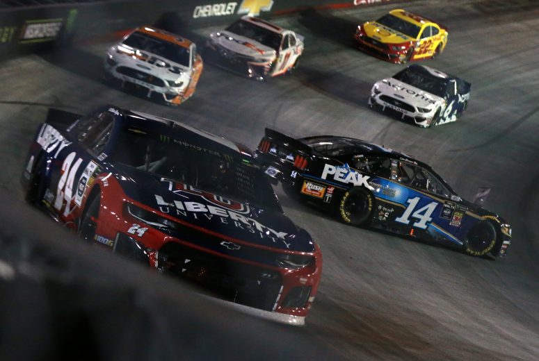 BRISTOL, TENNESSEE - AUGUST 17: Clint Bowyer, driver of the #14 Peak Lighting Ford, is involved in an on-track incident during the Monster Energy NASCAR Cup Series Bass Pro Shops NRA Night Race at Bristol Motor Speedway on August 17, 2019 in Bristol, Tennessee. (Photo by Sean Gardner/Getty Images) | Getty Images