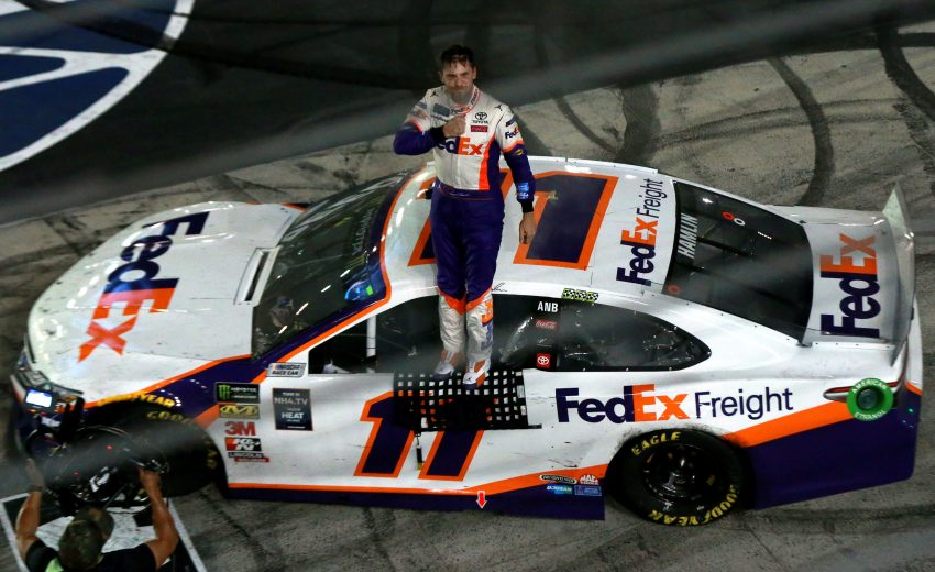BRISTOL, TENNESSEE - AUGUST 17: Denny Hamlin, driver of the #11 FedEx Freight Toyota, celebrates after winning the Monster Energy NASCAR Cup Series Bass Pro Shops NRA Night Race at Bristol Motor Speedway on August 17, 2019 in Bristol, Tennessee. (Photo by Sean Gardner/Getty Images) | Getty Images
