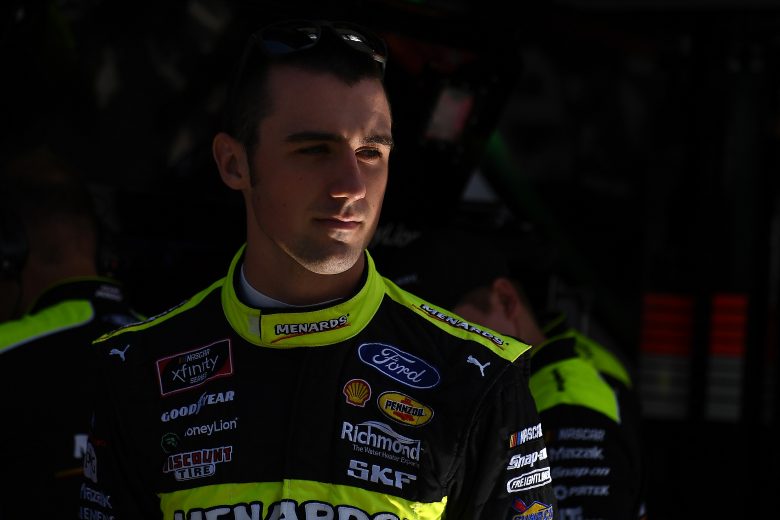 ELKHART LAKE, WISCONSIN - AUGUST 23: Austin Cindric, driver of the #22 Menards/Richmond Ford, stands by his car during practice for the NASCAR Xfinity Series CTECH Manufacturing 180 at Road America on August 23, 2019 in Elkhart Lake, Wisconsin. (Photo by Stacy Revere/Getty Images) | Getty Images