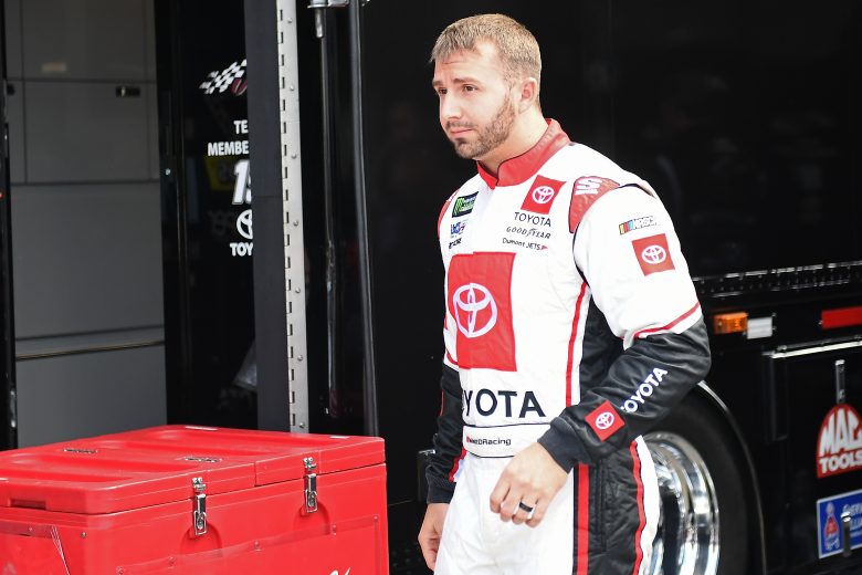 ELKHART LAKE, WISCONSIN - AUGUST 23: Matt DiBenedetto, driver of the #18 iK9 Toyota, walks to his car during practice for the NASCAR Xfinity Series CTECH Manufacturing 180 at Road America on August 23, 2019 in Elkhart Lake, Wisconsin. (Photo by Stacy Revere/Getty Images) | Getty Images