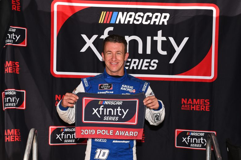 ELKHART LAKE, WISCONSIN - AUGUST 24: AJ Allmendinger, driver of the #10 J.W. Speaker/ CTECH Chevrolet, poses with the pole award after qualifying for the NASCAR Xfinity Series CTECH Manufacturing 180 at Road America on August 24, 2019 in Elkhart Lake, Wisconsin. (Photo by Stacy Revere/Getty Images) | Getty Images