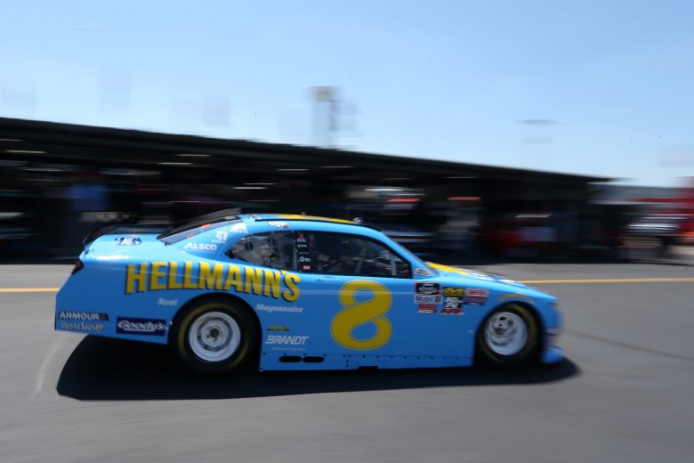 DARLINGTON, SOUTH CAROLINA - AUGUST 30: Dale Earnhardt Jr. drives the #8 Hellmann's Chevrolet through the garage area during practice for the NASCAR Xfinity Series Sport Clips Haircuts VFW 200 at Darlington Raceway on August 30, 2019 in Darlington, South Carolina. (Photo by Brian Lawdermilk/Getty Images) | Getty Images