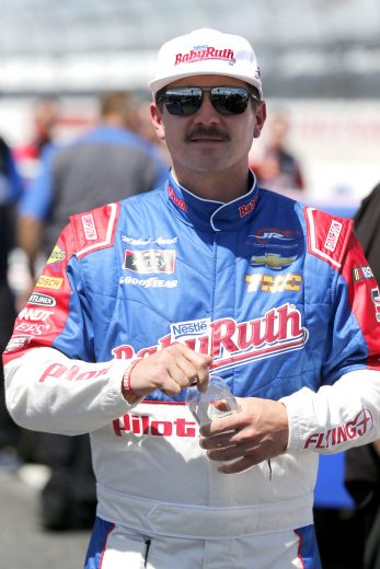 DARLINGTON, SOUTH CAROLINA - AUGUST 31: Michael Annett, driver of the #1 Baby Ruth Chevrolet, stands on the grid during qualifying for the NASCAR Xfinity Series Sport Clips Haircuts VFW 200 at Darlington Raceway on August 31, 2019 in Darlington, South Carolina. (Photo by Brian Lawdermilk/Getty Images) | Getty Images