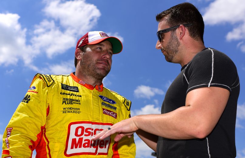 DARLINGTON, SOUTH CAROLINA - AUGUST 31: Ryan Newman, driver of the #6 Oscar Mayer/Velveeta Ford, and Matt DiBenedetto, driver of the #95 IMSA GTO Throwback Toyota, speak during qualifying for the Monster Energy NASCAR Cup Series Bojangles' Southern 500 at Darlington Raceway on August 31, 2019 in Darlington, South Carolina. (Photo by Jared C. Tilton/Getty Images) | Getty Images