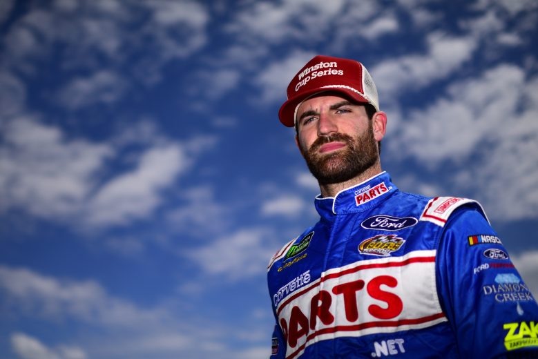 DARLINGTON, SOUTH CAROLINA - AUGUST 31: Corey LaJoie, driver of the #32 CorvetteParts.net Ford, stands on the grid during qualifying for the Monster Energy NASCAR Cup Series Bojangles' Southern 500 at Darlington Raceway on August 31, 2019 in Darlington, South Carolina. (Photo by Jared C. Tilton/Getty Images) | Getty Images