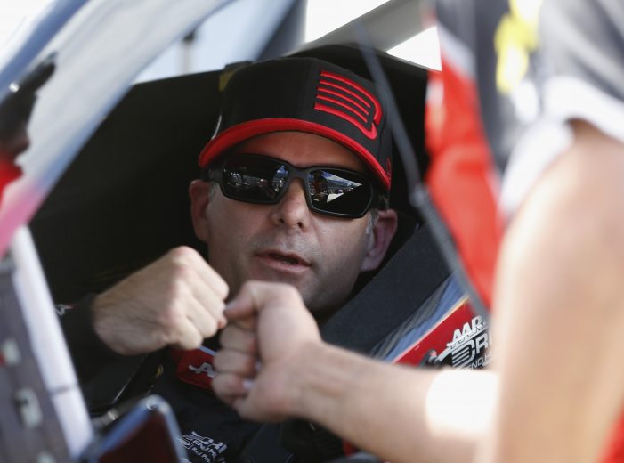 BROOKLYN, MI - JUNE 13:  Jeff Gordon, driver of the #24 Drive to End Hunger Chevrolet, sits in his car during qualifying for the NASCAR Sprint Cup Series Quicken Loans 400 at Michigan International Speedway on June 13, 2014 in Brooklyn, Michigan.  (Photo by Gregory Shamus/Getty Images) | Getty Images