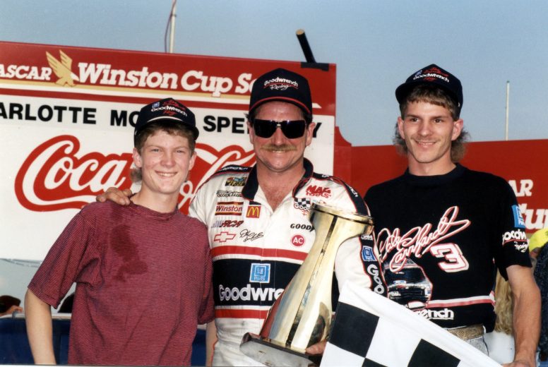 CONCORD, NC - MAY 24:  Dale Earnhardt poses in Victory Lane with his two sons, Dale Earnhardt Jr., left, and Kerry Earnhardt, right, after winning the Coca-Cola 600 race on May 24, 1992 at the Charlotte Motor Speedway in Concord, North Carolina.  (Photo by Dozier Mobley/Getty Images)