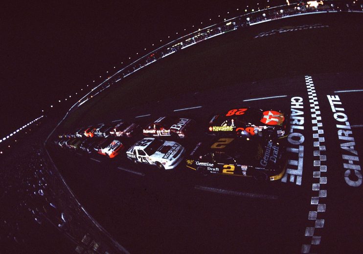 CONCORD, NC - 1992:  Davey Allison (No. 28) won The Winston All Star race coming from 3rd on the last lap after Kyle Petty and Dale Earnhardt got together in Turn 4. Rusty Wallace (No. 2) is shown outside at the Charlotte Motor Speedway in Concord, North Carolina.  (Photo by ISC Archives via Getty Images)