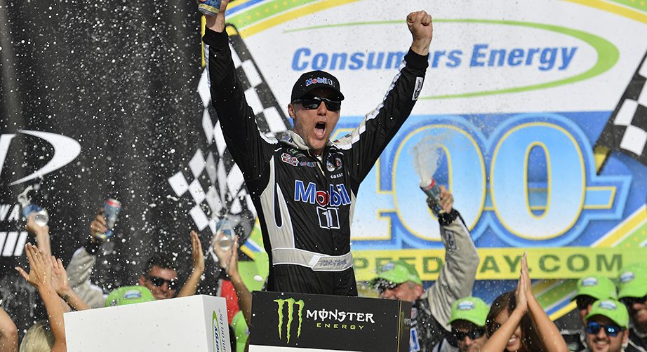 BROOKLYN, MICHIGAN - AUGUST 11: Kevin Harvick, driver of the #4 Mobil 1 Ford, celebrates in Victory Lane after winning the Monster Energy NASCAR Cup Series Consumers Energy 400 at Michigan International Speedway on August 11, 2019 in Brooklyn, Michigan. (Photo by Quinn Harris/Getty Images) | Getty Images