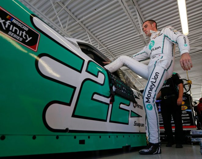 LAS VEGAS, NEVADA - SEPTEMBER 13: Austin Cindric, driver of the #22 MoneyLion Ford, gets into the car during practice for the NASCAR Xfinity Series Rhino Pro Truck Outfitters 300 at Las Vegas Motor Speedway on September 13, 2019 in Las Vegas, Nevada. (Photo by Jonathan Ferrey/Getty Images) | Getty Images