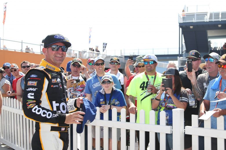 LAS VEGAS, NEVADA - SEPTEMBER 14: Clint Bowyer, driver of the #14 Toco Warranty Ford, signs autographs after qualifying for the Monster Energy NASCAR Cup Series South Point 400 at Las Vegas Motor Speedway on September 14, 2019 in Las Vegas, Nevada. (Photo by Matt Sullivan/Getty Images) | Getty Images