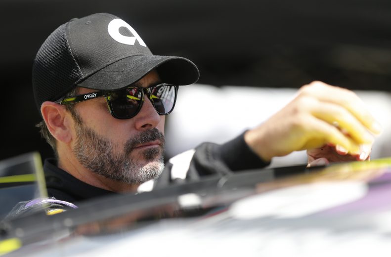 BRISTOL, TENNESSEE - AUGUST 16: Jimmie Johnson, driver of the #48 Ally Chevrolet, stands in the garage area during practice for the Monster Energy NASCAR Cup Series Bass Pro Shops NRA Night Race at Bristol Motor Speedway on August 16, 2019 in Bristol, Tennessee. (Photo by Brian Lawdermilk/Getty Images) | Getty Images