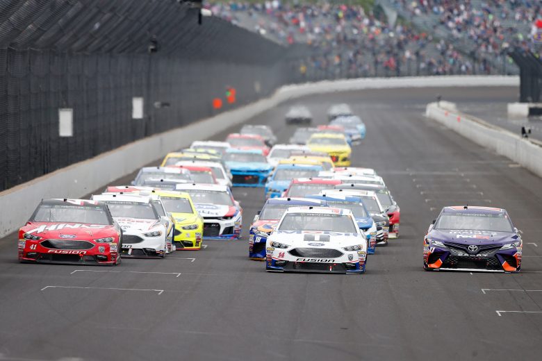 INDIANAPOLIS, IN - SEPTEMBER 10:  Kurt Busch, driver of the #41 Haas Automation/Monster Energy Ford, Clint Bowyer, driver of the #14 Mobil 1/Rush Truck Centers Ford, and Denny Hamlin, driver of the #11 FedEx Possibilities Toyota, lead the field during the Monster Energy NASCAR Cup Series Big Machine Vodka 400 at the Brickyard at Indianapolis Motor Speedway on September 10, 2018 in Indianapolis, Indiana.  (Photo by Brian Lawdermilk/Getty Images) | Getty Images