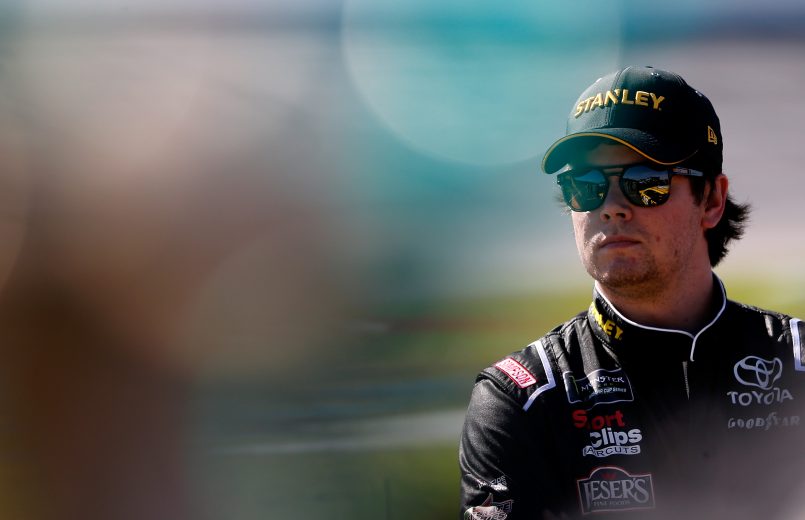 TALLADEGA, AL - APRIL 27: Erik Jones, driver of the #20 STANLEY Toyota, stands on the grid during qualifying for the Monster Energy NASCAR Cup Series GEICO 500 at Talladega Superspeedway on April 27, 2019 in Talladega, Alabama. (Photo by Brian Lawdermilk/Getty Images) | Getty Images