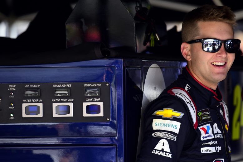 BRISTOL, TENNESSEE - AUGUST 16: William Byron, driver of the #24 Liberty University Chevrolet, stands in the garage during practice for the Monster Energy NASCAR Cup Series Bass Pro Shops NRA Night Race at Bristol Motor Speedway on August 16, 2019 in Bristol, Tennessee. (Photo by Jared C. Tilton/Getty Images) | Getty Images