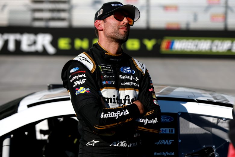 BRISTOL, TENNESSEE - AUGUST 16: Aric Almirola, driver of the #10 Smithfield Ford, stands on pit road during qualifying for the Monster Energy NASCAR Cup Series Bass Pro Shops NRA Night Race at Bristol Motor Speedway on August 16, 2019 in Bristol, Tennessee. (Photo by Sean Gardner/Getty Images) | Getty Images