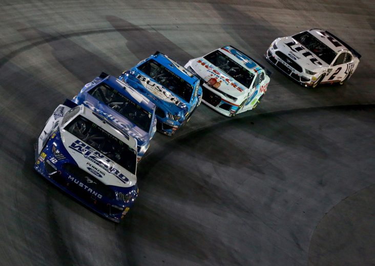 BRISTOL, TENNESSEE - AUGUST 17: Ryan Blaney, driver of the #12 Dent Wizard Ford, leads a pack of cars during the Monster Energy NASCAR Cup Series Bass Pro Shops NRA Night Race at Bristol Motor Speedway on August 17, 2019 in Bristol, Tennessee. (Photo by Sean Gardner/Getty Images) | Getty Images