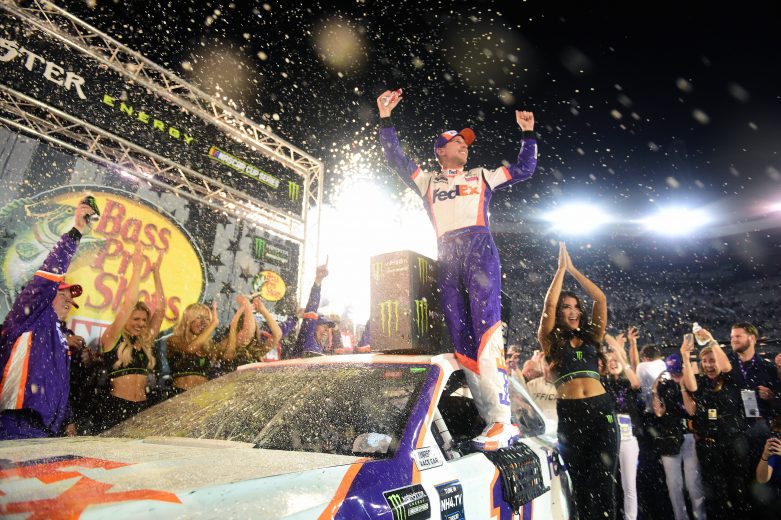 BRISTOL, TENNESSEE - AUGUST 17: Denny Hamlin, driver of the #11 FedEx Freight Toyota, celebrates in Victory Lane after winning the Monster Energy NASCAR Cup Series Bass Pro Shops NRA Night Race at Bristol Motor Speedway on August 17, 2019 in Bristol, Tennessee. (Photo by Jared C. Tilton/Getty Images) | Getty Images