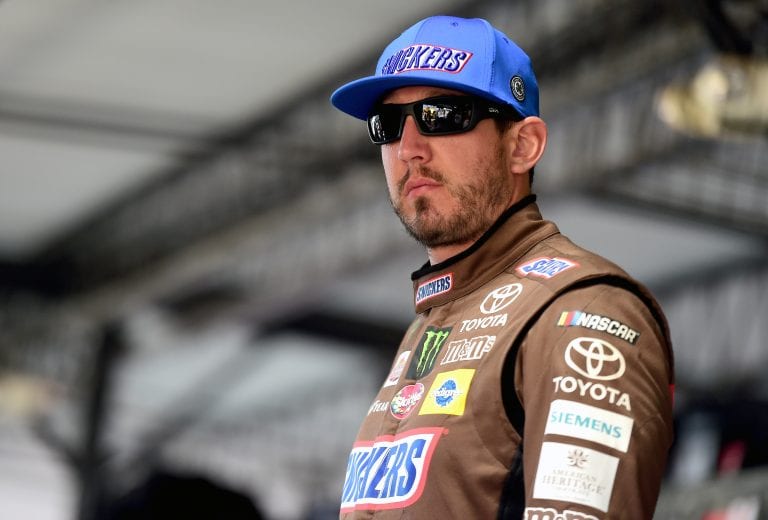 DARLINGTON, SOUTH CAROLINA - AUGUST 30: Kyle Busch, driver of the #18 Snickers Throwback Toyota, looks on during practice for the Monster Energy NASCAR Cup Series Bojangles' Southern 500 at Darlington Raceway on August 30, 2019 in Darlington, South Carolina. (Photo by Jared C. Tilton/Getty Images) | Getty Images
