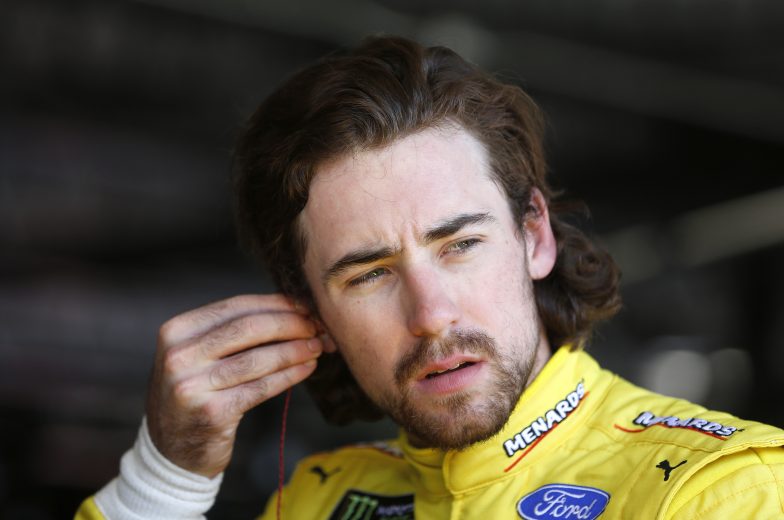DARLINGTON, SOUTH CAROLINA - AUGUST 30: Ryan Blaney, driver of the #12 Menards/Pennzoil Ford, stands in the garage area during practice for the Monster Energy NASCAR Cup Series Bojangles' Southern 500 at Darlington Raceway on August 30, 2019 in Darlington, South Carolina. (Photo by Brian Lawdermilk/Getty Images) | Getty Images
