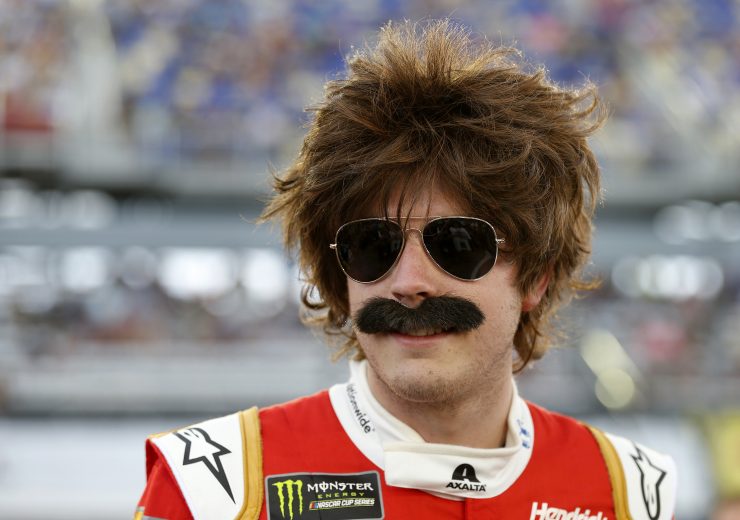 DARLINGTON, SOUTH CAROLINA - SEPTEMBER 01: Alex Bowman, driver of the #88 Axalta Throwback Chevrolet, wears a costume before the start of the Monster Energy NASCAR Cup Series Bojangles' Southern 500 at Darlington Raceway on September 01, 2019 in Darlington, South Carolina. (Photo by Brian Lawdermilk/Getty Images) | Getty Images