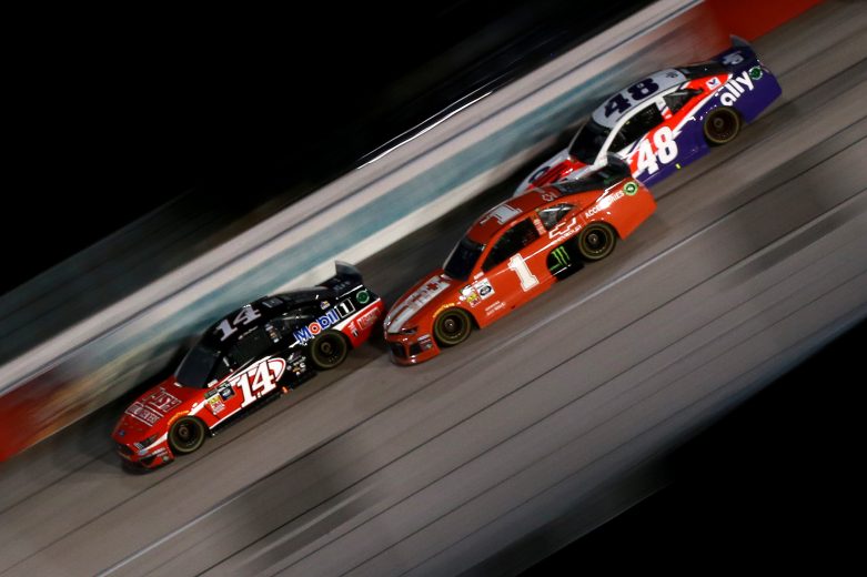 DARLINGTON, SOUTH CAROLINA - SEPTEMBER 01: Clint Bowyer, driver of the #14 Rush Truck Centers/Mobil 1 Ford, leads a pack of cars during the Monster Energy NASCAR Cup Series Bojangles' Southern 500 at Darlington Raceway on September 01, 2019 in Darlington, South Carolina. (Photo by Sean Gardner/Getty Images) | Getty Images