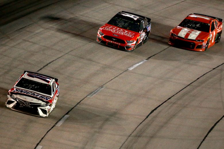 DARLINGTON, SOUTH CAROLINA - SEPTEMBER 01: Kyle Busch, driver of the #18 Snickers Throwback Toyota, leads a pack of cars during the Monster Energy NASCAR Cup Series Bojangles' Southern 500 at Darlington Raceway on September 01, 2019 in Darlington, South Carolina. (Photo by Sean Gardner/Getty Images) | Getty Images