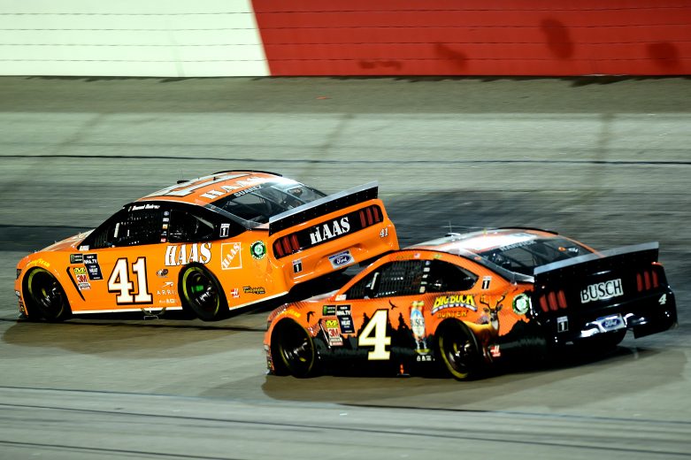DARLINGTON, SOUTH CAROLINA - SEPTEMBER 02: Daniel Suarez, driver of the #41 Haas Automation Ford, leads Kevin Harvick, driver of the #4 Busch Beer/Big Buck Hunter Ford, during the Monster Energy NASCAR Cup Series Bojangles' Southern 500 at Darlington Raceway on September 02, 2019 in Darlington, South Carolina. (Photo by Jared C. Tilton/Getty Images) | Getty Images