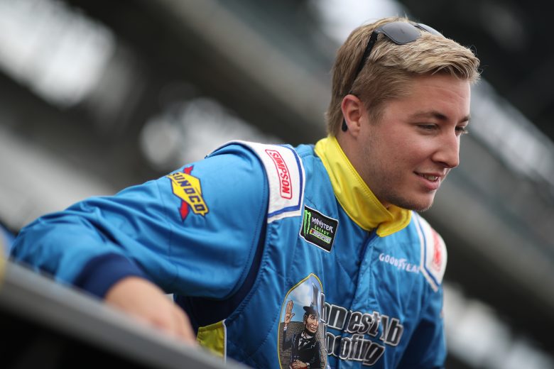 INDIANAPOLIS, INDIANA - SEPTEMBER 07: Garrett Smithley, driver of the #52 Honest Abe Roofing Ford, stands on the grid  during qualifying for the Monster Energy NASCAR Cup Series Big Machine Vodka 400 at the Brickyard at Indianapolis Motor Speedway on September 08, 2019 in Indianapolis, Indiana. (Photo by Chris Graythen/Getty Images) | Getty Images
