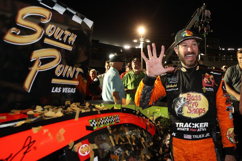 LAS VEGAS, NEVADA - SEPTEMBER 15: Martin Truex Jr., driver of the #19 Bass Pro Shops Toyota, places the winner's sticker on his car after winning the Monster Energy NASCAR Cup Series South Point 400 at Las Vegas Motor Speedway on September 15, 2019 in Las Vegas, Nevada. (Photo by Chris Graythen/Getty Images) | Getty Images