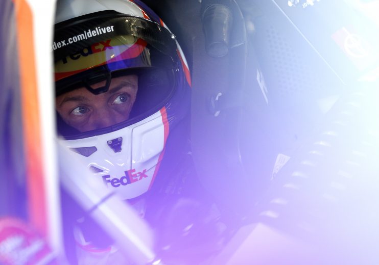 RICHMOND, VIRGINIA - SEPTEMBER 20: Denny Hamlin, driver of the #11 FedEx Office Toyota, sits in his car during practice for the Monster Energy NASCAR Cup Series Federated Auto Parts 400 at Richmond Raceway on September 20, 2019 in Richmond, Virginia. (Photo by Brian Lawdermilk/Getty Images) | Getty Images