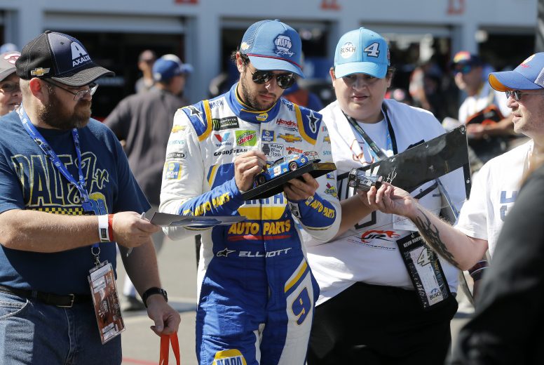 RICHMOND, VIRGINIA - SEPTEMBER 20: Chase Elliott, driver of the #9 NAPA Chevrolet, signs autographs during practice for the Monster Energy NASCAR Cup Series Federated Auto Parts 400 at Richmond Raceway on September 20, 2019 in Richmond, Virginia. (Photo by Brian Lawdermilk/Getty Images) | Getty Images